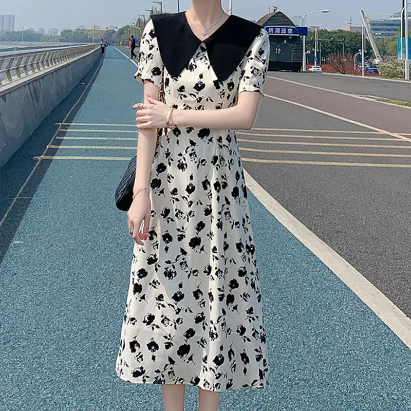 

French Style High-end Doll Neck Floral Dress for Women's Summer 2024 New Loose Slimming Temperament Casual Fairy Dress