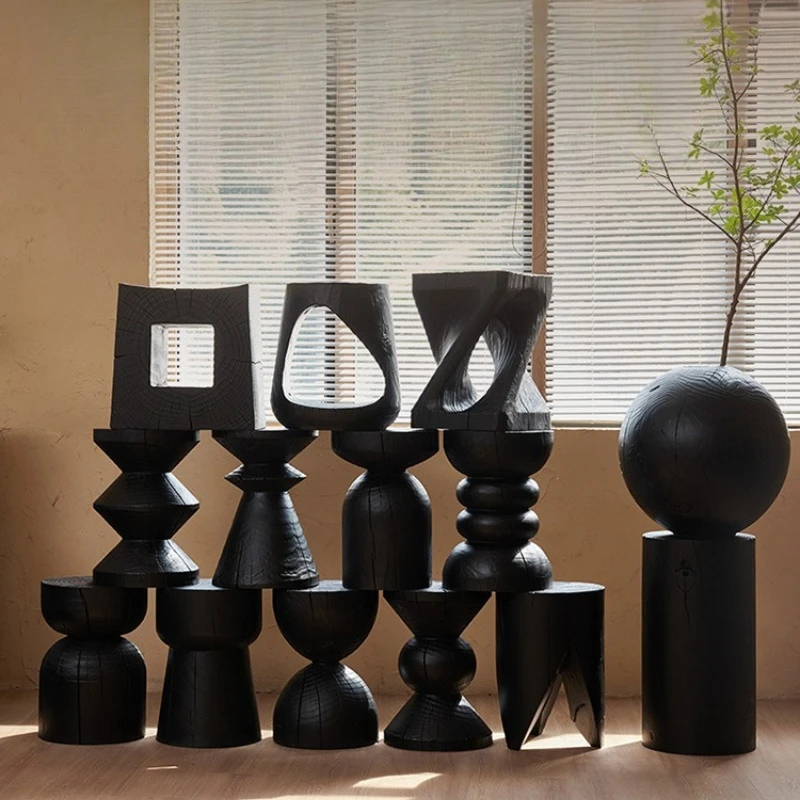 

Solid wood pier carbonized black Nordic log stool, bed and breakfast side few wooden piles ornament root carving base