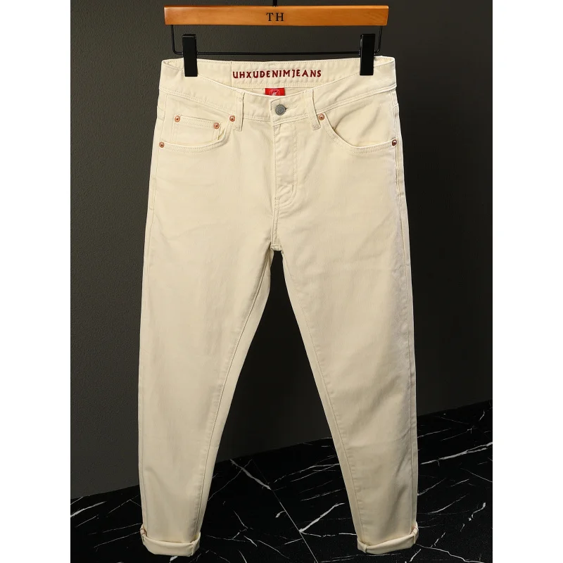 

2025 новые высококачественные бежевые мужские джинсы, простые вышитые буквы, эластичные, модные брюки на небольшую ногу