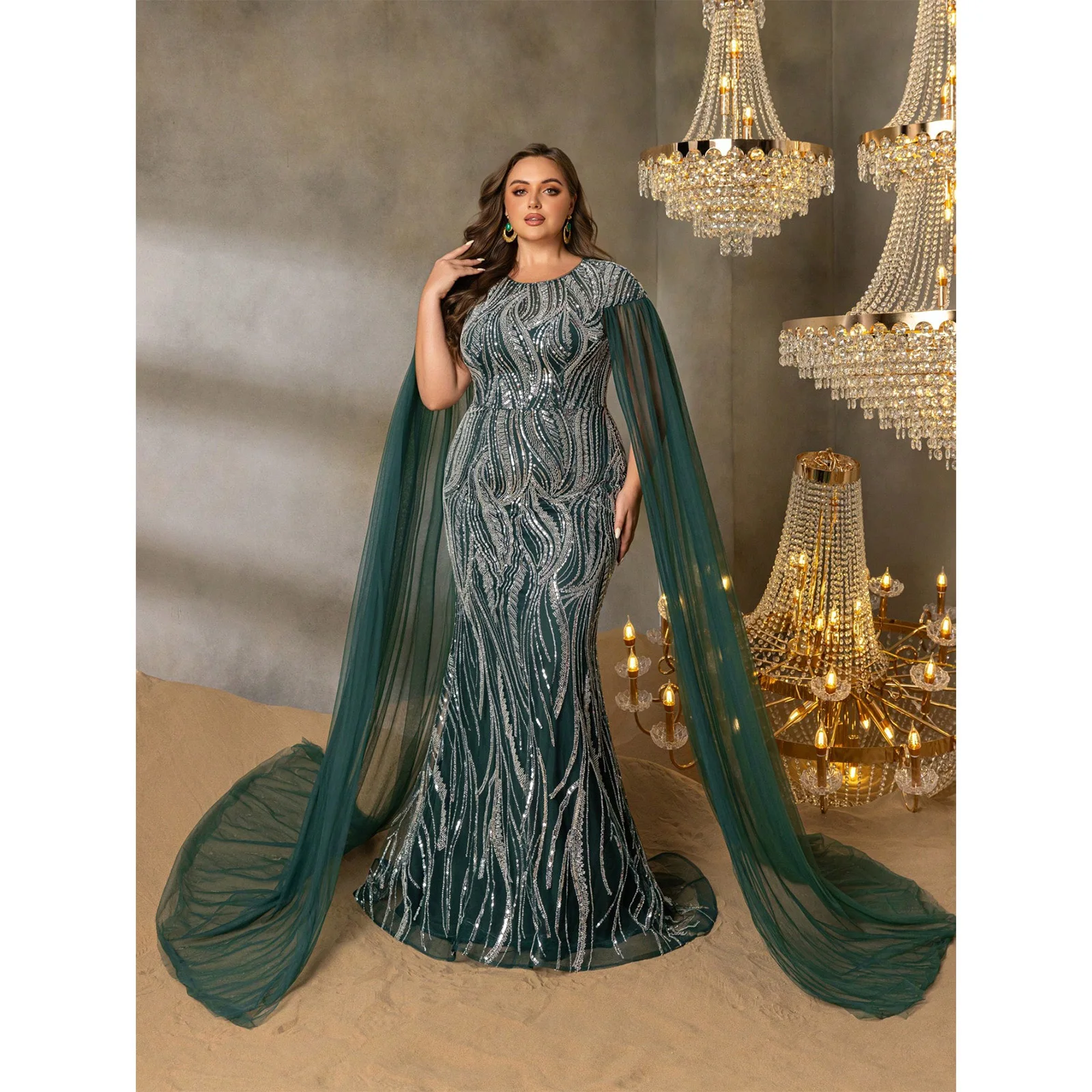 

Plus-size emerald green round neck beaded sequined evening gown with oversized tulle sleeves and a mermaid-style train. 2026