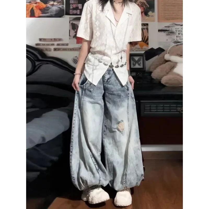 American retro bloomers with holes in jeans women's loose autumn and winter design sense niche drooping wide-leg pants.