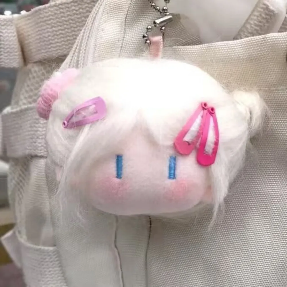 Peluche cheveux longs poupée pendentif dessin animé conception poupée fille poupée fille tête porte-clés poupée mignonne