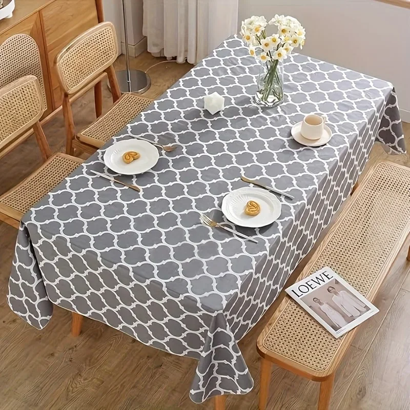 Easy-to-clean thick rectangular vinyl tablecloth with flannel backing, 60 inches * 84 inches / 52 inches * 70 inches in black.