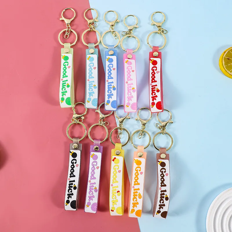 miniso Pink translucent lollipop leather rope keychain pendant, cartoon oiled accessory, key chain ring bracelet