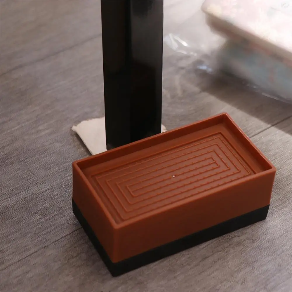 Almohadilla de pie ajustable para muebles, elevadores de escritorio antideslizantes, elevador de muebles de cama, soporte para mesa y silla con absorción de impacto en forma de Chocolate