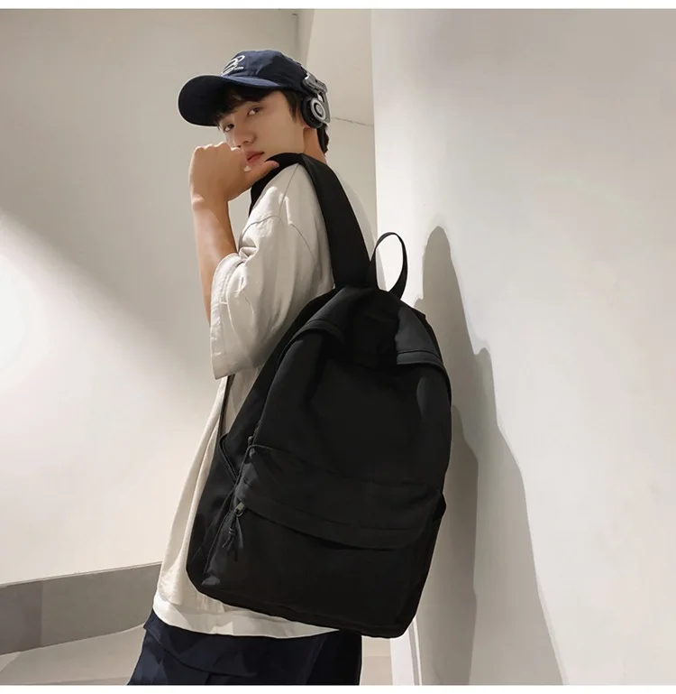 حقيبة ظهر عالية الجودة ذات سعة كبيرة بلون نقي حقيبة كتب مدرسية عالمية لطلاب الجامعات الابتدائية والثانوية