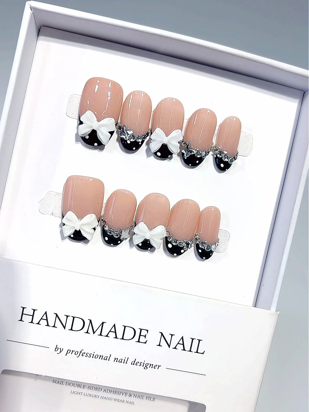 

Pastel Nude Polka Dot Press on Nails - White Bow Rhinestone Accent Short Oval False Nails Handmade for Women（C452）