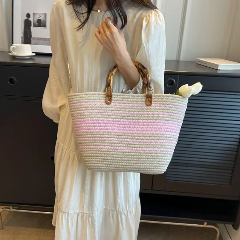 

2024 New Large Capacity Seaside Resort Straw Bag Hand-woven Handbag Ins Niche Commuter Tote Bag Women Holiday Woven Bag