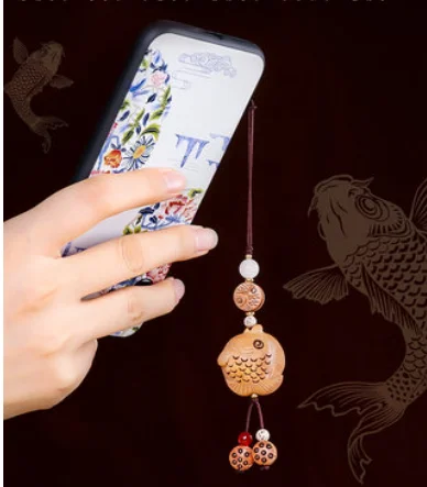 

Car key pendant handmade creative Chinese style peach wood sandalwood fish keychain pendant