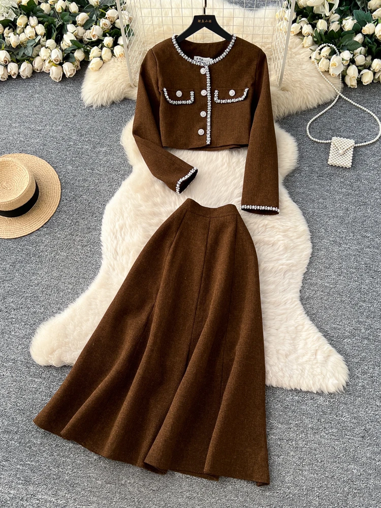 

Осенний женский модный комплект для поездок на работу: кардиган с металлической пряжкой и юбка-полусолнце с высокой талией, роскошный комплект из двух предметов