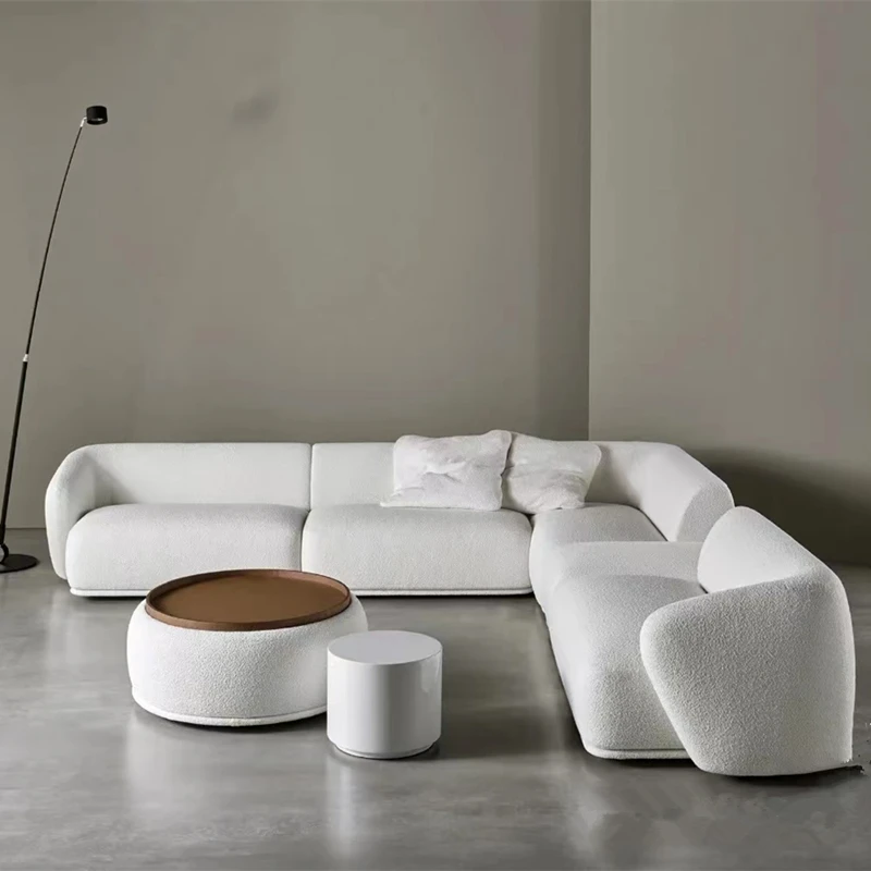 

The sofa is curved Nordic-style cream white fabric sofa