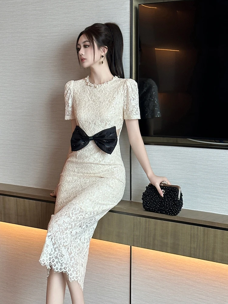 Robe longue en dentelle pour femmes, tempérament français, élégante, célébrité, perlée, col rond, manches courtes, taille haute, enveloppée dans les hanches, été