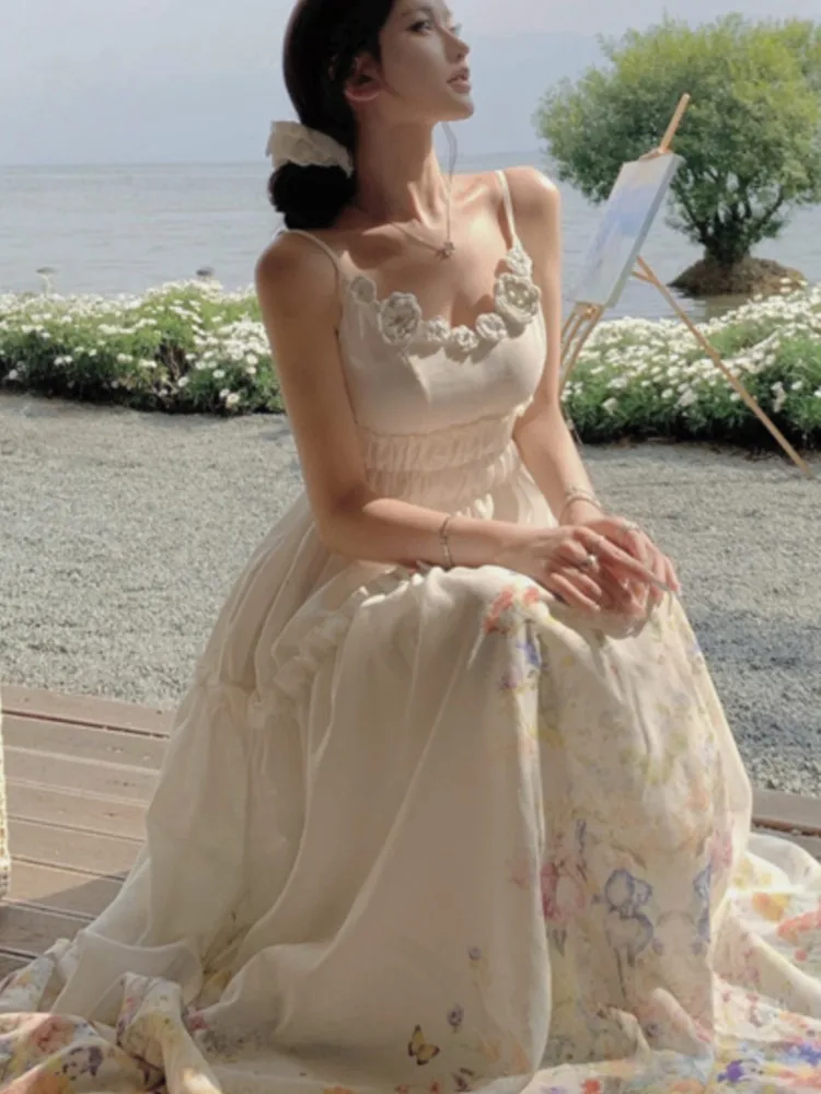 ผู้หญิงปาร์ตี้วันหยุดฤดูร้อนชุดยาวสง่างามสายรัดปาเก็ตตี้เก๋แขนกุดพิมพ์ลายดอกไม้วินเทจเดรสวันหยุดชายหาดโบโฮ
