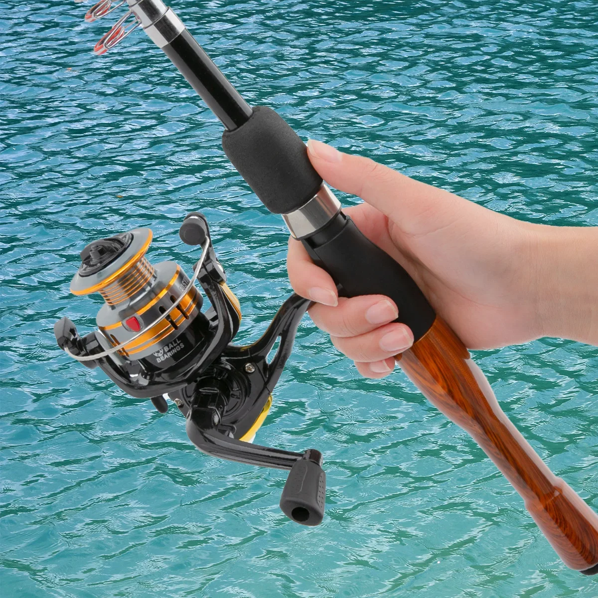 初心者練習超短伸縮ルヤ釣り竿投げ、激しく岩竿を投げ出すことはできません