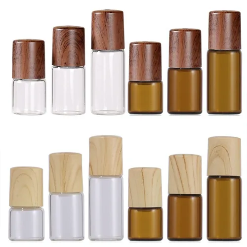 20X 50X botellas enrollables de aceite esencial de vidrio 1/2/3/5ml viales de rodillo ámbar/transparente tapas de plástico (aspecto de madera) tapas Perfume Mini nuevo