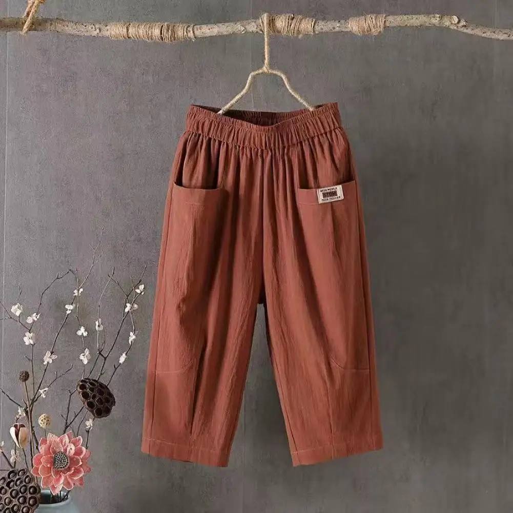 

Women Summer Cropped Pants Mid-rise Elastic Waistband Wide Leg Casual Pants Solid Color Pockets Design Harem Trousers