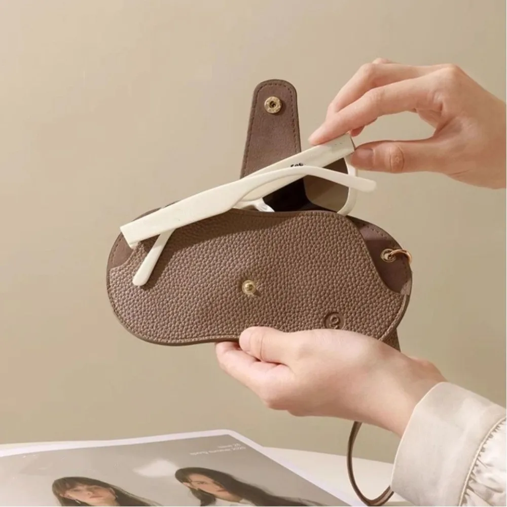 Portátil pendurado óculos saco lichia padrão couro do plutônio óculos saco de armazenamento óculos cor sólida titular