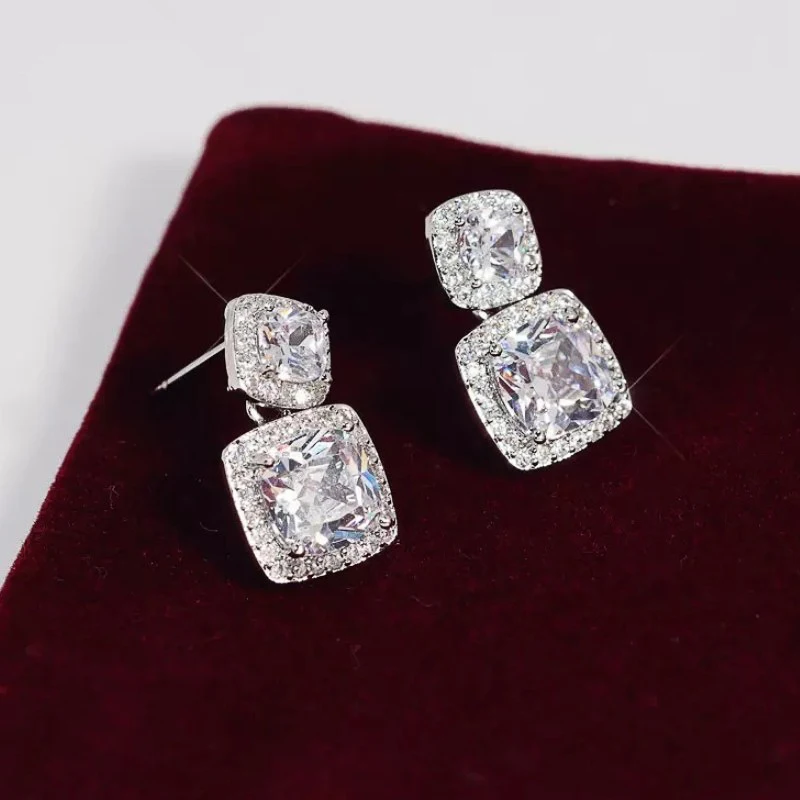 Huitan-pendientes colgantes de cristal CZ para mujer, accesorio de moda para la oreja, joyería de Color plateado de alta calidad