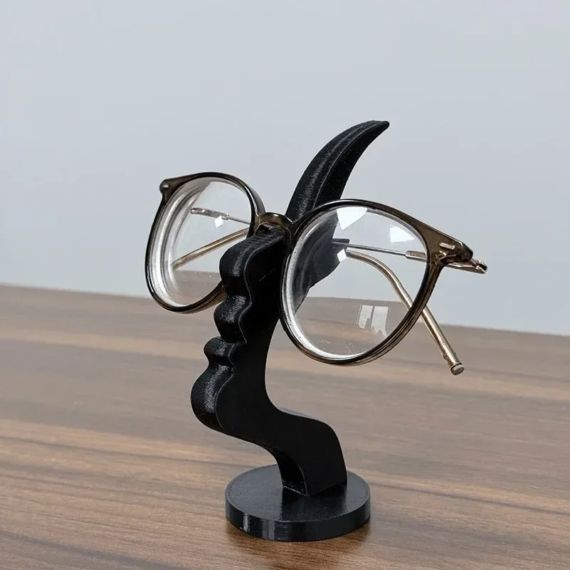 Elegant Side Face Glasses Holder - Minimalist Black Design, Secure Artistic Storage Solution for Desk or Bedside, Ideal Holiday
