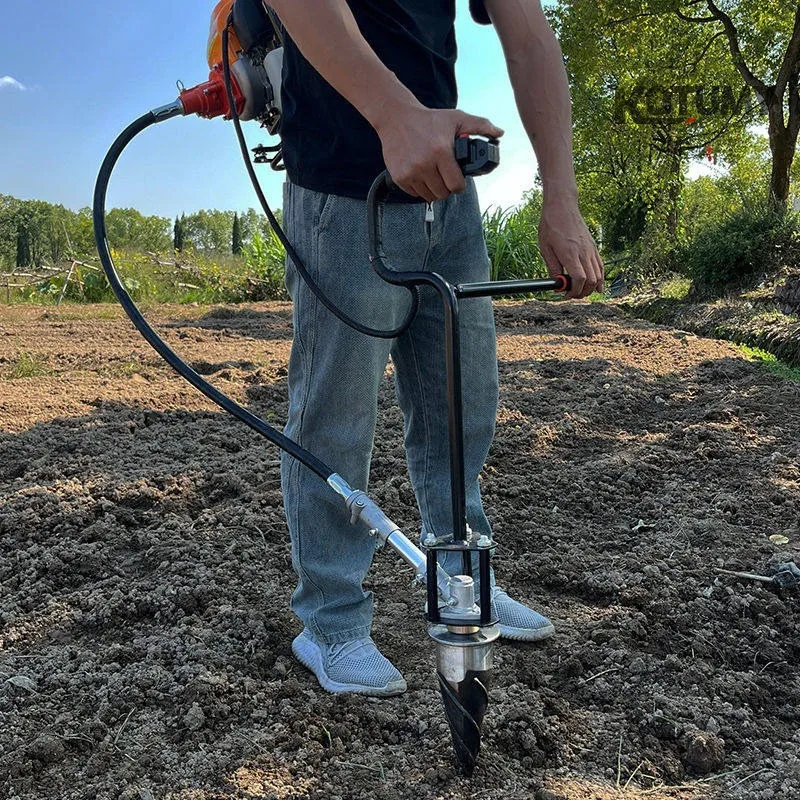 Carrying lawn mower tobacco planting machine hole making machine hole digging machine tobacco drill planting and punching machin