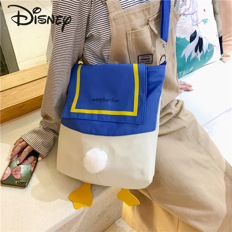 Disney-Bolso cruzado de dibujos animados de pato Donald para niños, bolso de compras de ocio versátil de alta calidad, a la moda, para mujer