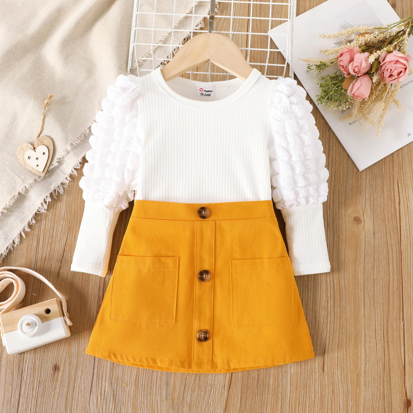 

PatPat 2pcs Toddler Girl Textured Puff-sleeve White Tee and Button Pocket Design Cotton Skirt Set