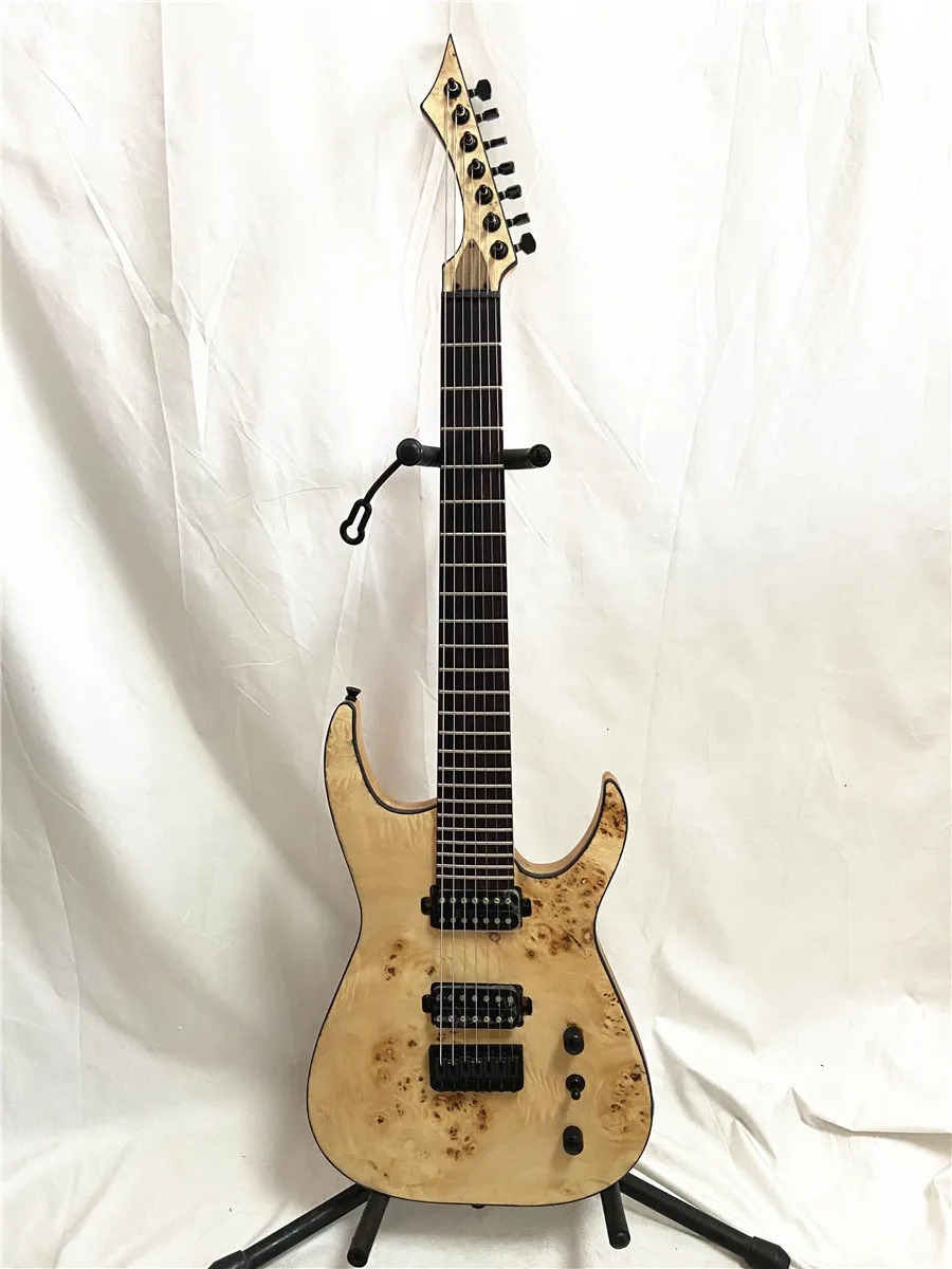 Custom edition 7 string electric guitar in wood color rose wood fingerboard fixed guitar bridge can be customized