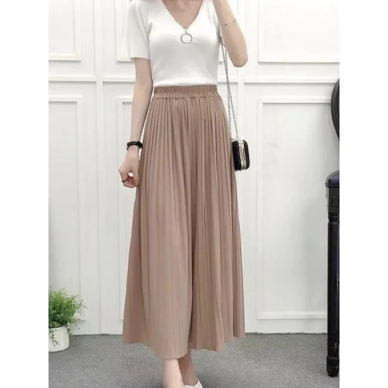 Novedad de verano, pantalones para mujer, moda coreana, falda holgada plisada con cintura lisa elástica, pantalones cortos informales de pierna ancha de talla grande