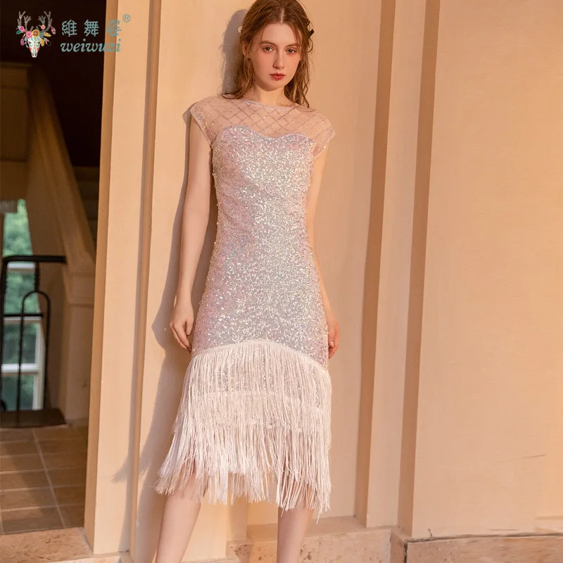 Abito femminile sexy con frange di paillettes O-Collo senza maniche Vedi attraverso la maglia aderente Abito con nappe stanche Abito da banchetto per feste con glitter