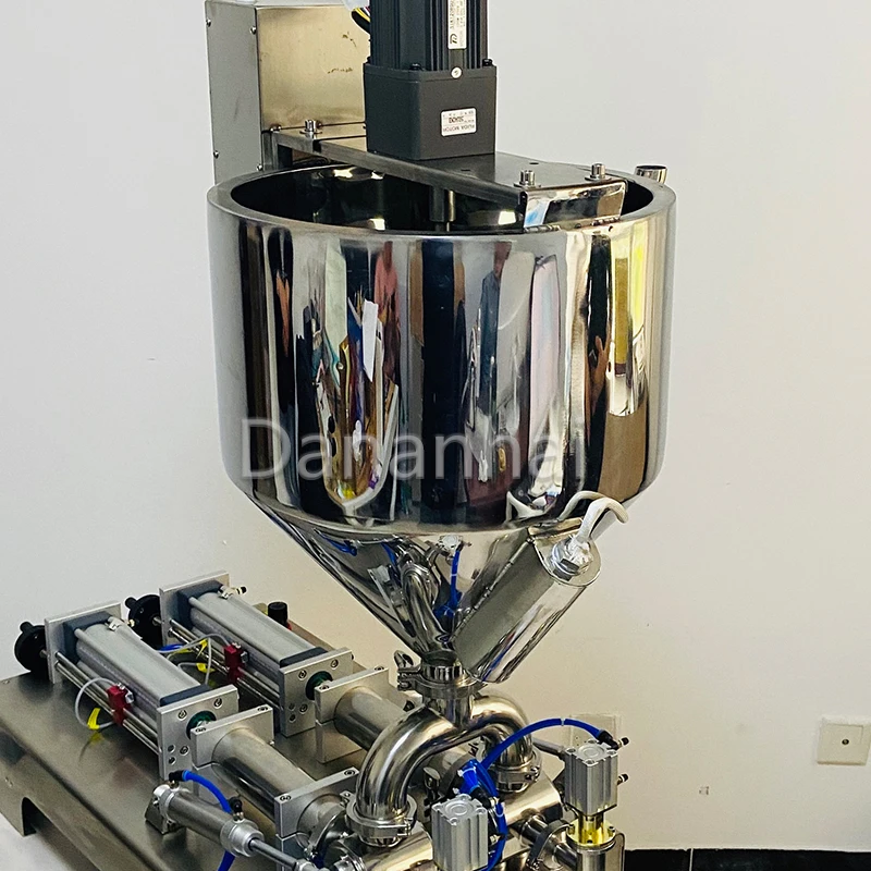 

Double Head Honey Bottle Packaging Machine with Mixer And Heater Automatic Filling Machine for Food And Beverage
