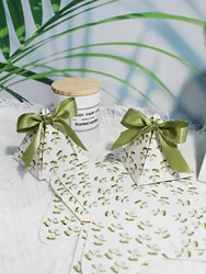 Stylish Pyramid-Shaped Gift Boxes Featuring Green Palm Tree Patterns and Green Ribbons, Perfect for Parties and Festive Events