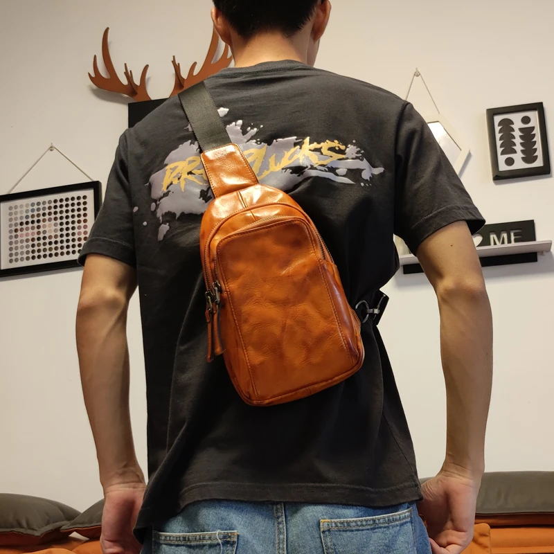 

PNDME fashion vintage vegetable tanned cowhide men's chest bag weekend party shoulder bag sports genuine leather crossbody bag