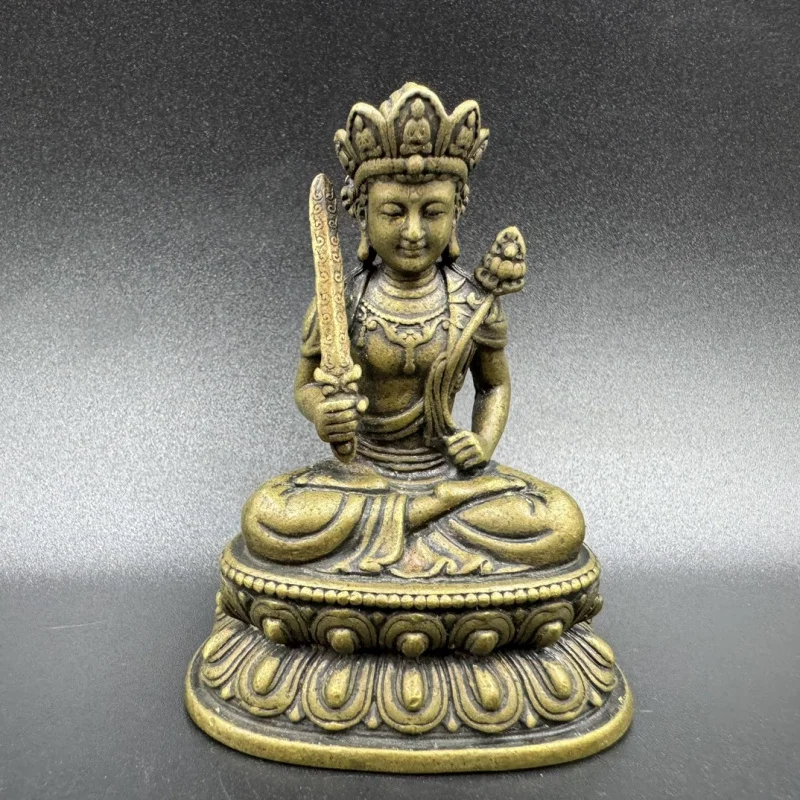 

Void Ornament Ox God Holding Lotus and Sword Guanyin Antique Brass Buddha Statue