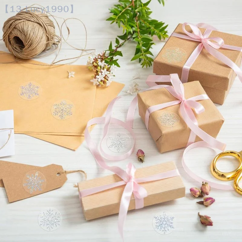 【CCA13】500枚/ロール 透明雪の結晶ステッカー クリスマスタグステッカー 子供用ギフト ベーキングパッケージ 封筒デコレーション