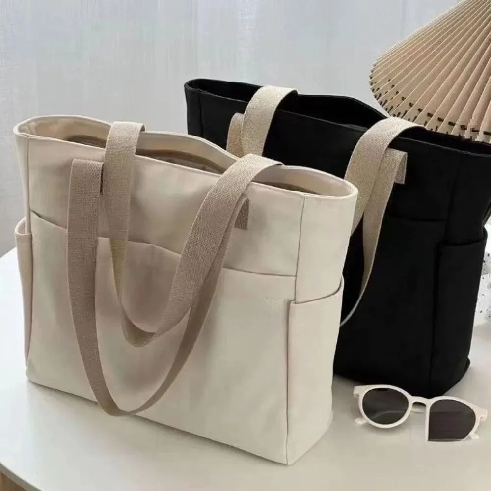 キャンバスショルダーバッグ 日本製 防水 カジュアル スポーツ ストリートバッグ マルチポケット 大容量 ファッション クロスボディバッグ 学生