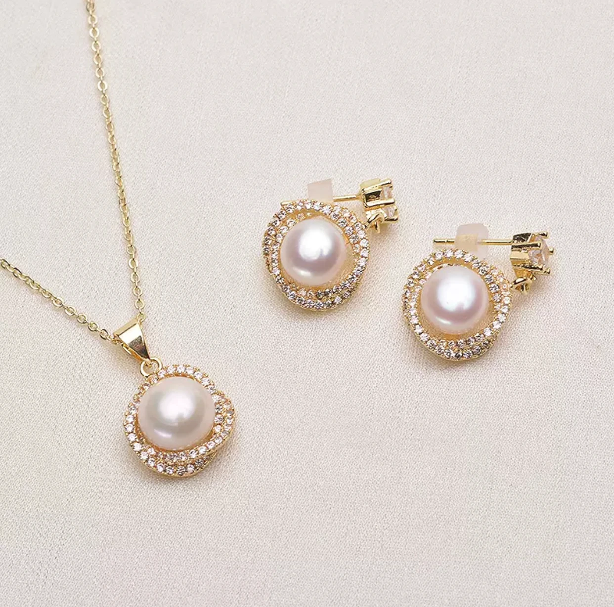 

Luxurious natural freshwater pearl set 9-10mm steamed bun pearl high gloss high-end design jewelry set
