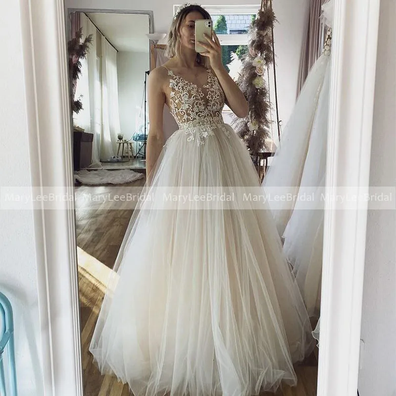 

Illusion Skin Mesh Boho Wedding Dresses Spaghetti Strap Custom Made Light Champagne Princess Tulle Bridal Gowns Suknia ślubna