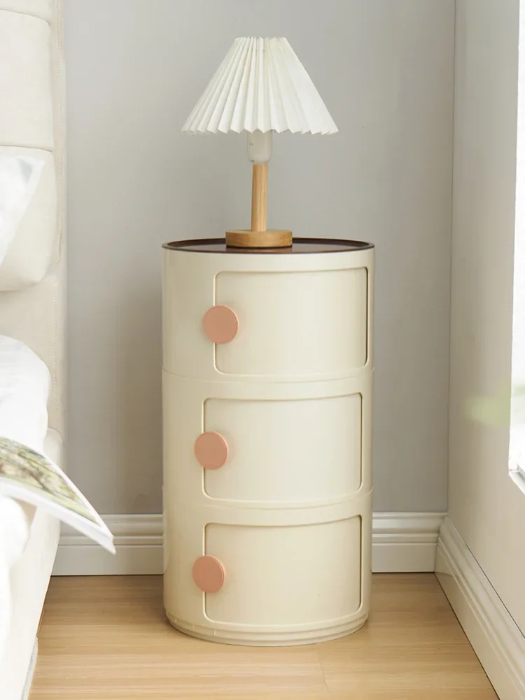 Modern minimalist storage cabinet Small mini side table Designer circular cabinet Narrow ins Simple plastic bedside cabinet