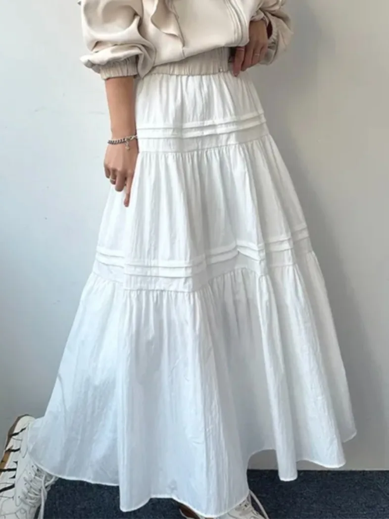 Elegancka spódnica midi o kroju litery A z wysokim stanem, wyszczuplająca, uniwersalna, plisowana, łączona, o długości do połowy łydki, w stylu koreańskim, idealna do pracy.