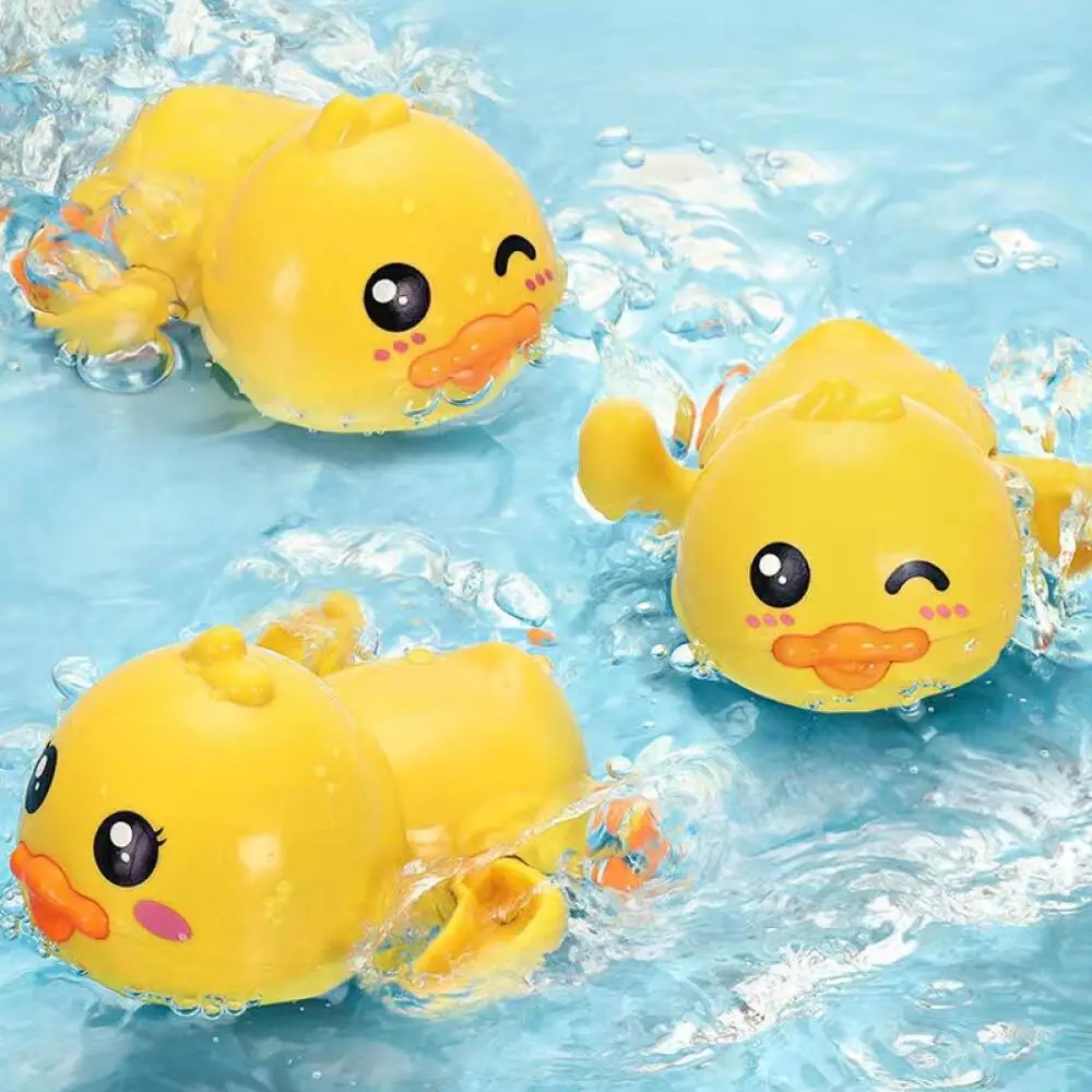 Mini cute little yellow duck baby bath toys children\'s pool water toys