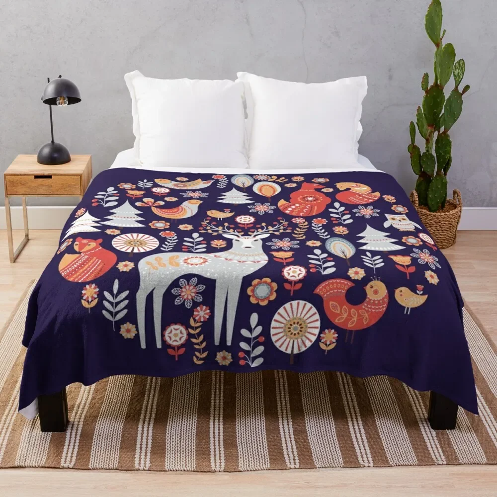 

Fairy-tale forest. Foxes, deer, birds, owls, flowers and herbs on a blue background. Throw Blanket