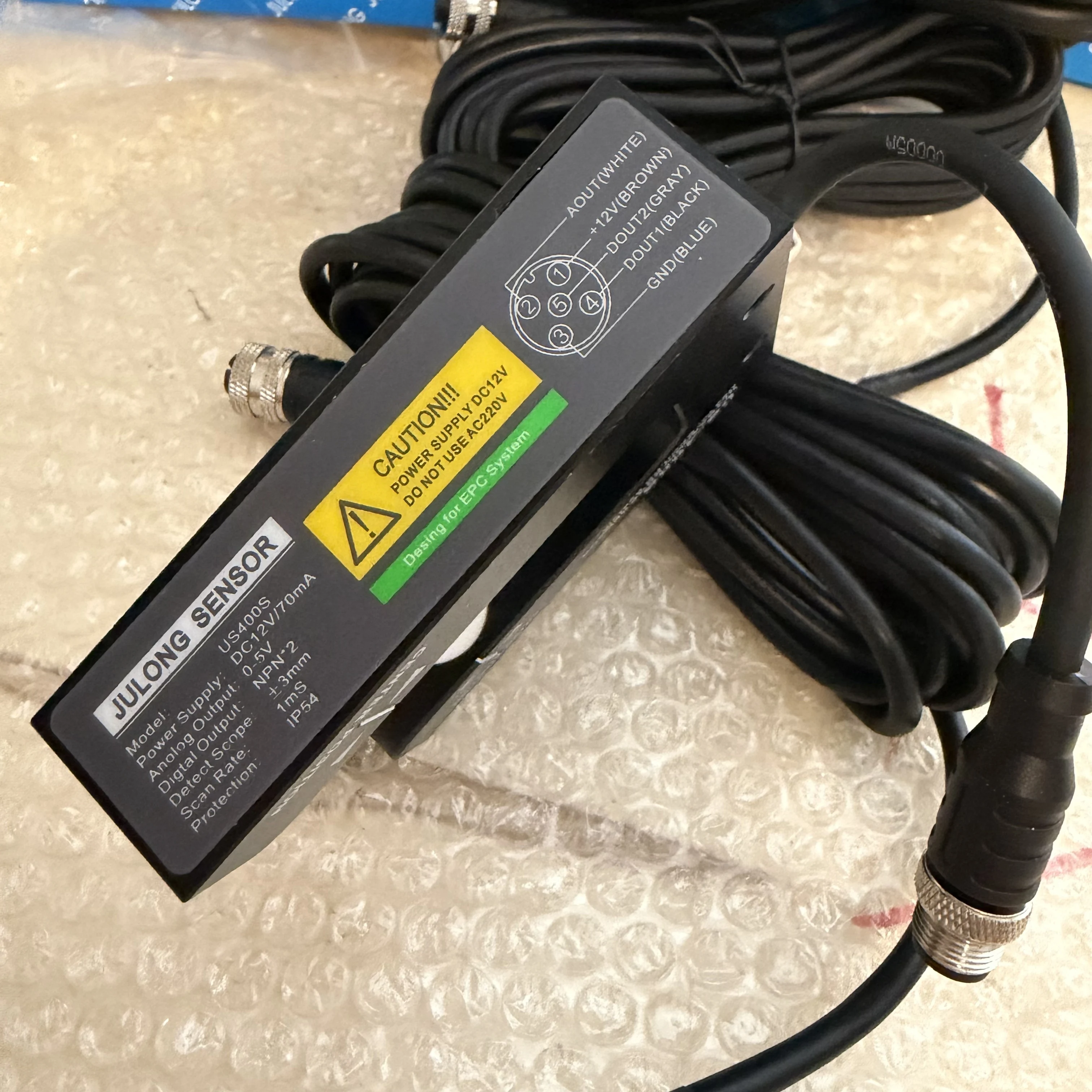 The US-400S Ultrasonic Sensor for EPC/LPC Systems Is Suitable for Bag Making Machines and Printing Machines