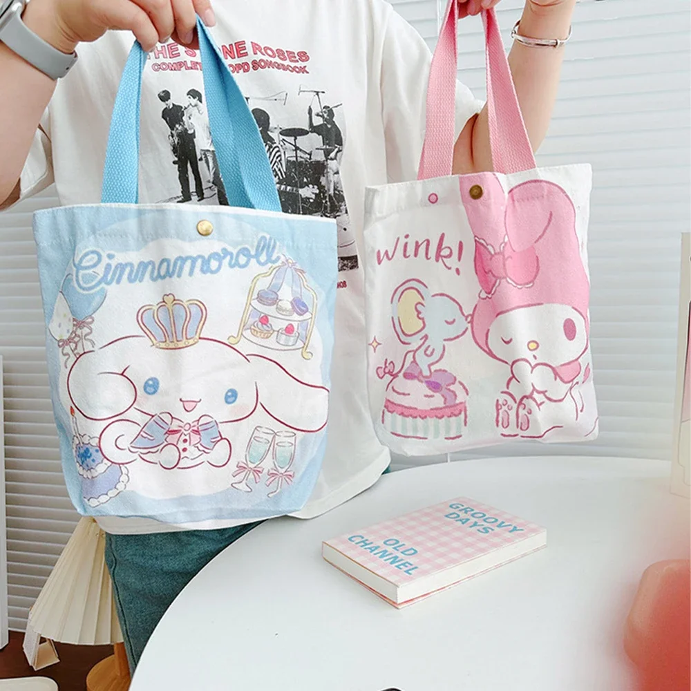 Sanrio กระเป๋าผ้าแคนวาสลาย My Melody กระเป๋ากระเป๋าสะพายไหล่ Cinnamoroll อนิเมะ Kuromi กระเป๋าถือช้อปปิ้งความจุสูงกระเป๋าเก็บการ์ตูนของขวัญเด็กผู้หญิง