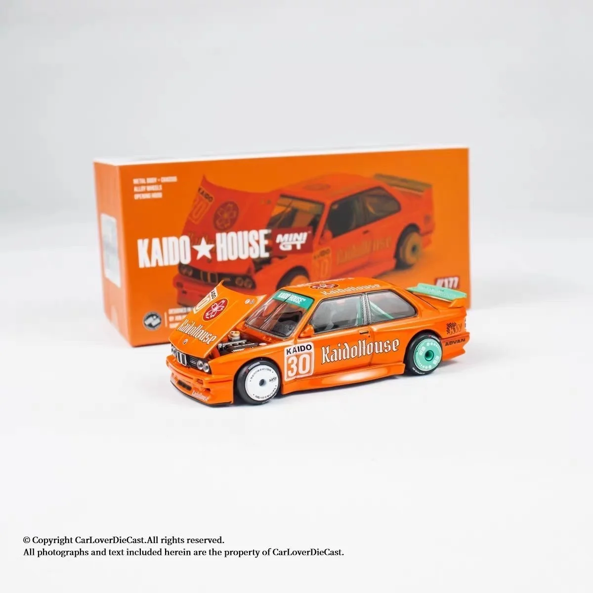 

Kaido House x MINI GT M3 KaidoHaus V1 Orange Collection Miniature DieCast Model Car