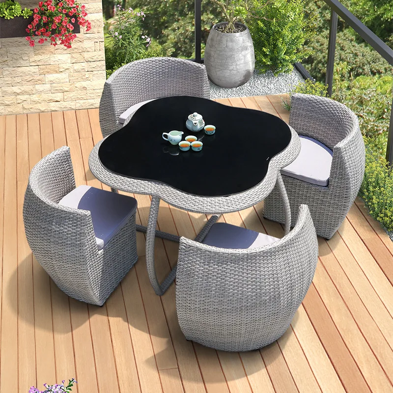 Outdoor table and chair courtyard outdoor rattan open-air garden waterproof and sunscreen wrought iron rock slab dining table