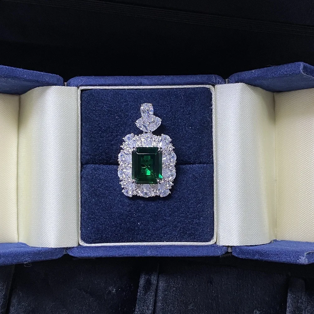 PT950 platinum Emerald Cut pendant with bottom seal of PT950 platinum fully set with diamonds