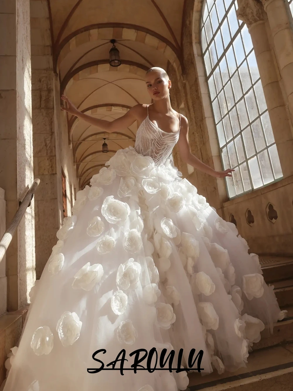 

Luxury Pearl Beaded Spaghetti Straps Wedding Dress Dreamy Romantic 3D Floral Tulle Ball Gown Backless Bridal Gown With Train