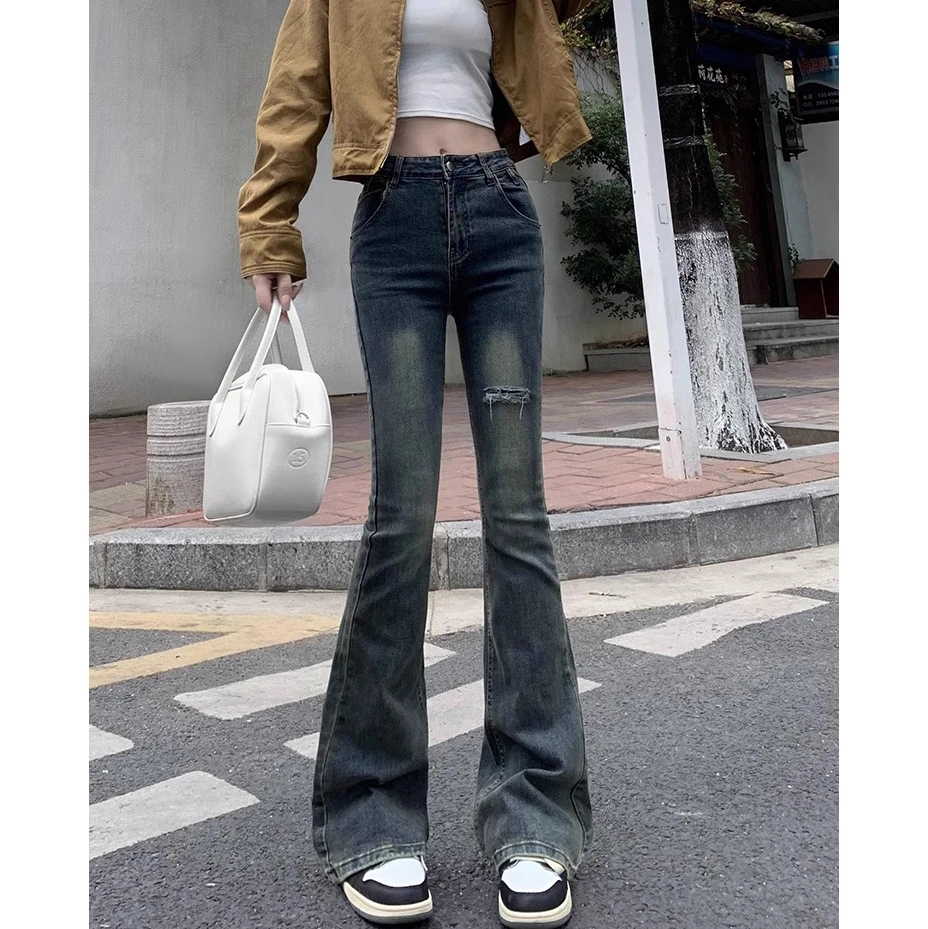 

Broken holes micro-large jeans female spring new Spice Girls high-waisted tight elastic thin do old flare horseshoe pants