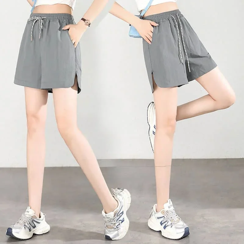 팝 솔리드 반바지 여성 캐주얼 루즈 파라슈트 A라인 와이드 레그 반바지 사파리 스타일 밴딩 허리 핫팬츠 스트릿웨어 여성 의류