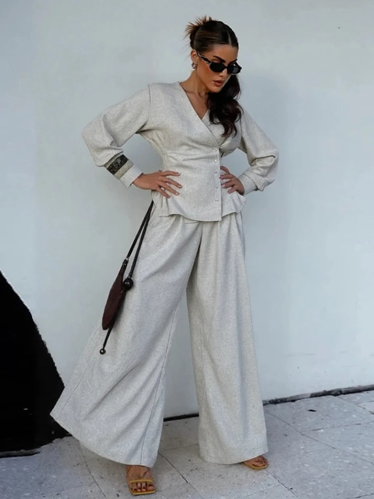 

Elegant Solid Slim Women 2 Pcs Suits V-neck Full Sleeve Waist Cinching Irregular Buttons Tops Wide Leg Trousers Fashion Outfits